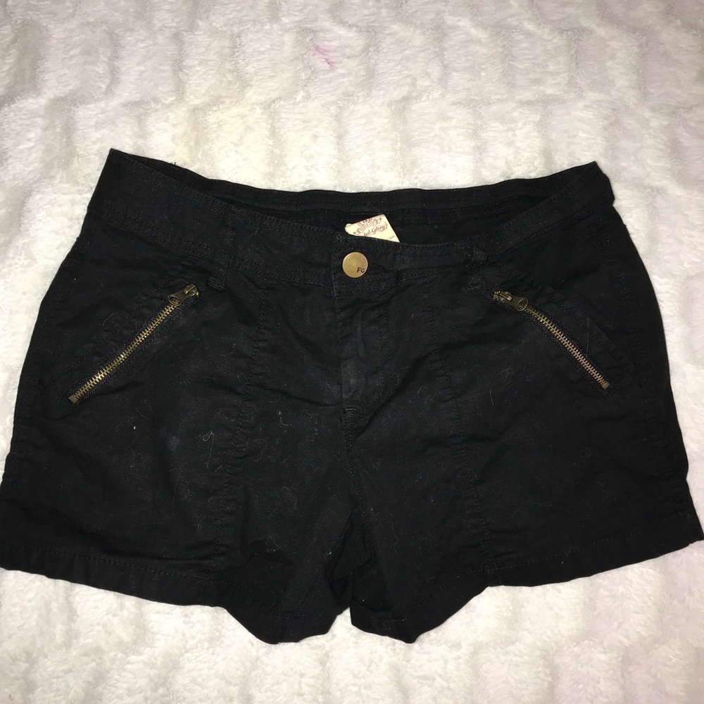 black zipper shorts